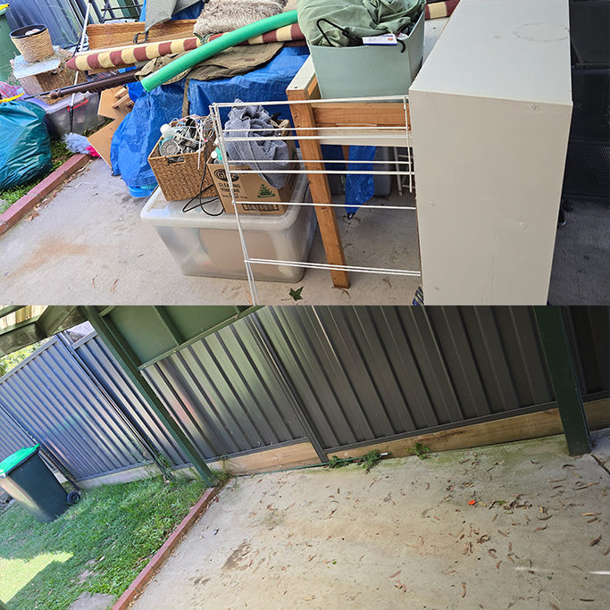 Backyard rubbish and junk stacked against a fence in Melbourne