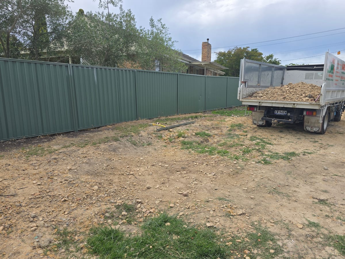 Cleared side yard after construction waste and brick removal in Melbourne