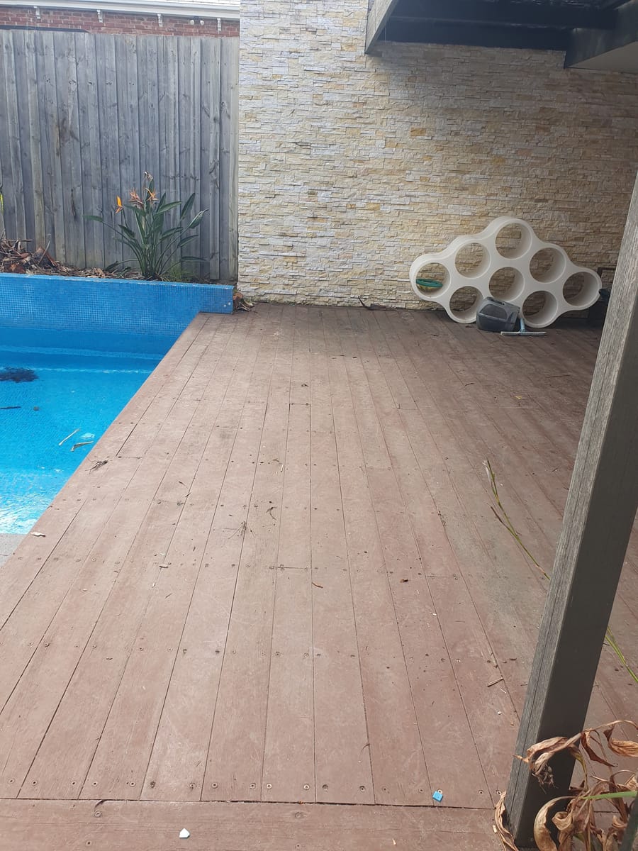 Cleared pool deck after green waste and garden clipping removal in Melbourne