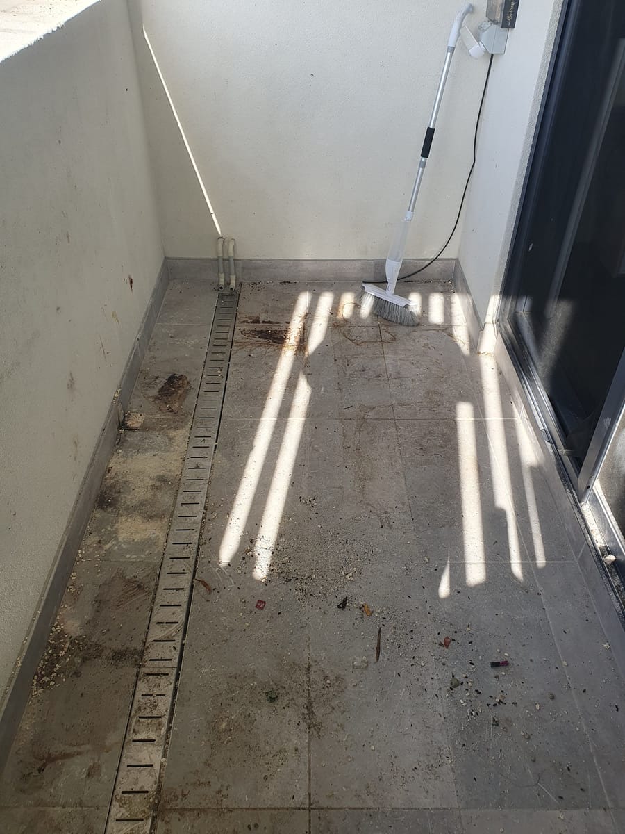 Cleared tiled balcony after household rubbish removal in Melbourne